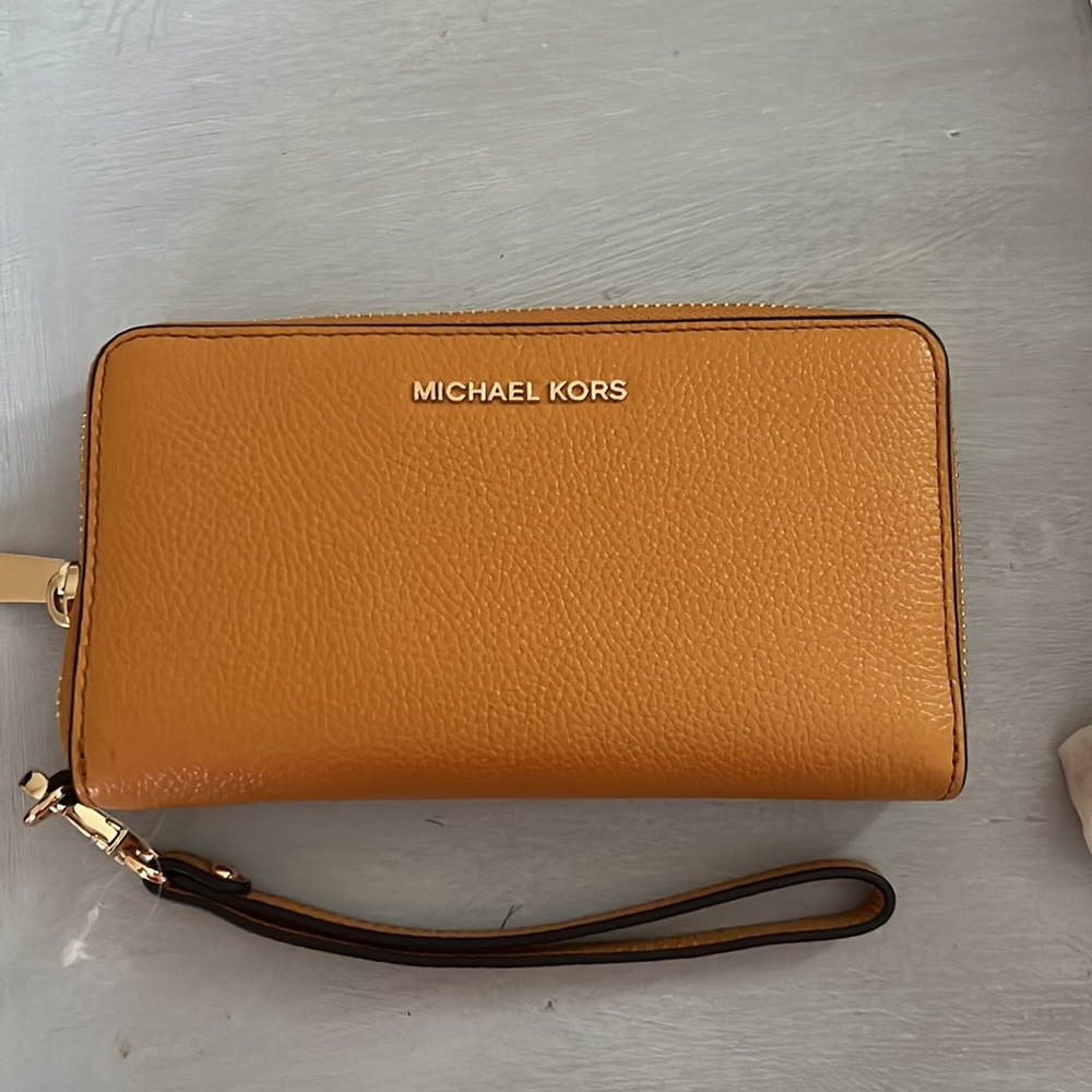 Michael Kors leather wallet in Cider. Brand new with tags.